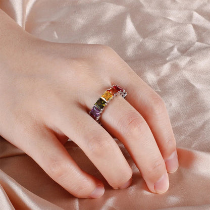 a close up of a person holding a hot dog 